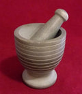 GRAY MORTAR AND PESTLE