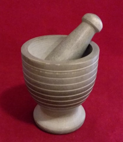 GRAY MORTAR AND PESTLE